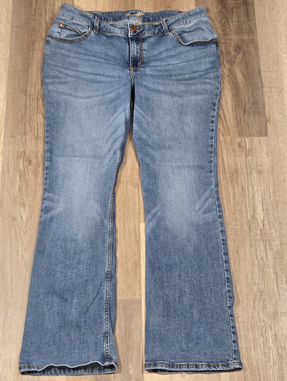 Wrangler women's bootcut jeans in a medium wash